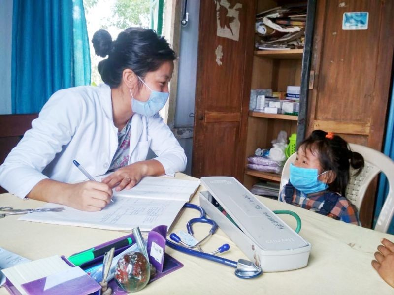 The medical staff at Hebolimi Health and Wellness Center were in for a pleasant surprise on Thursday when 3-year old Lipavi, all masked up, showed up at the health centre. Lipavi reportedly had common cold symptoms the previous night but since her parents had left for the field, the 3-year old decided to come all by herself for a checkup at the centre where she was attended to by the Community Health Officer. (Photo Courtesy: IEC Bureau, CMO Office Zunheboto)